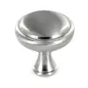 Are there holes drilled for the hardware,  wanted to use my own round knobs, either white porcelain or glass cryst